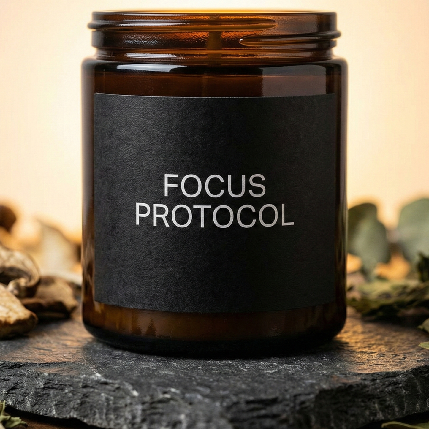 Brown jar labeled 'Focus Protocol' on a dark surface with blurred natural background